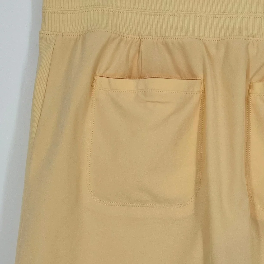 Athleta Women Brooklyn Athletic Skort Size‎ 10 Pale Yellow Golf Tennis Pockets